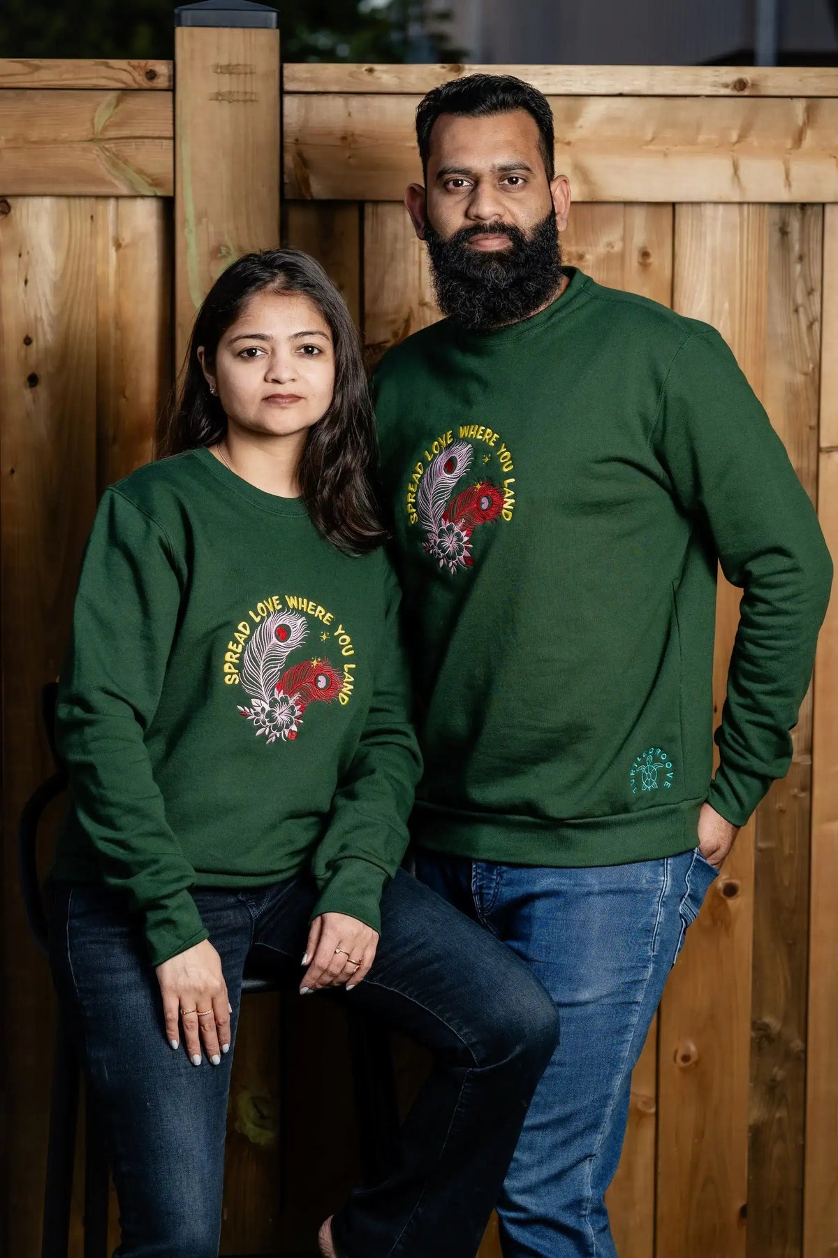 SpreadLove embroidered sweatshirt by TURTLEGROOVE – model wearing, forest green