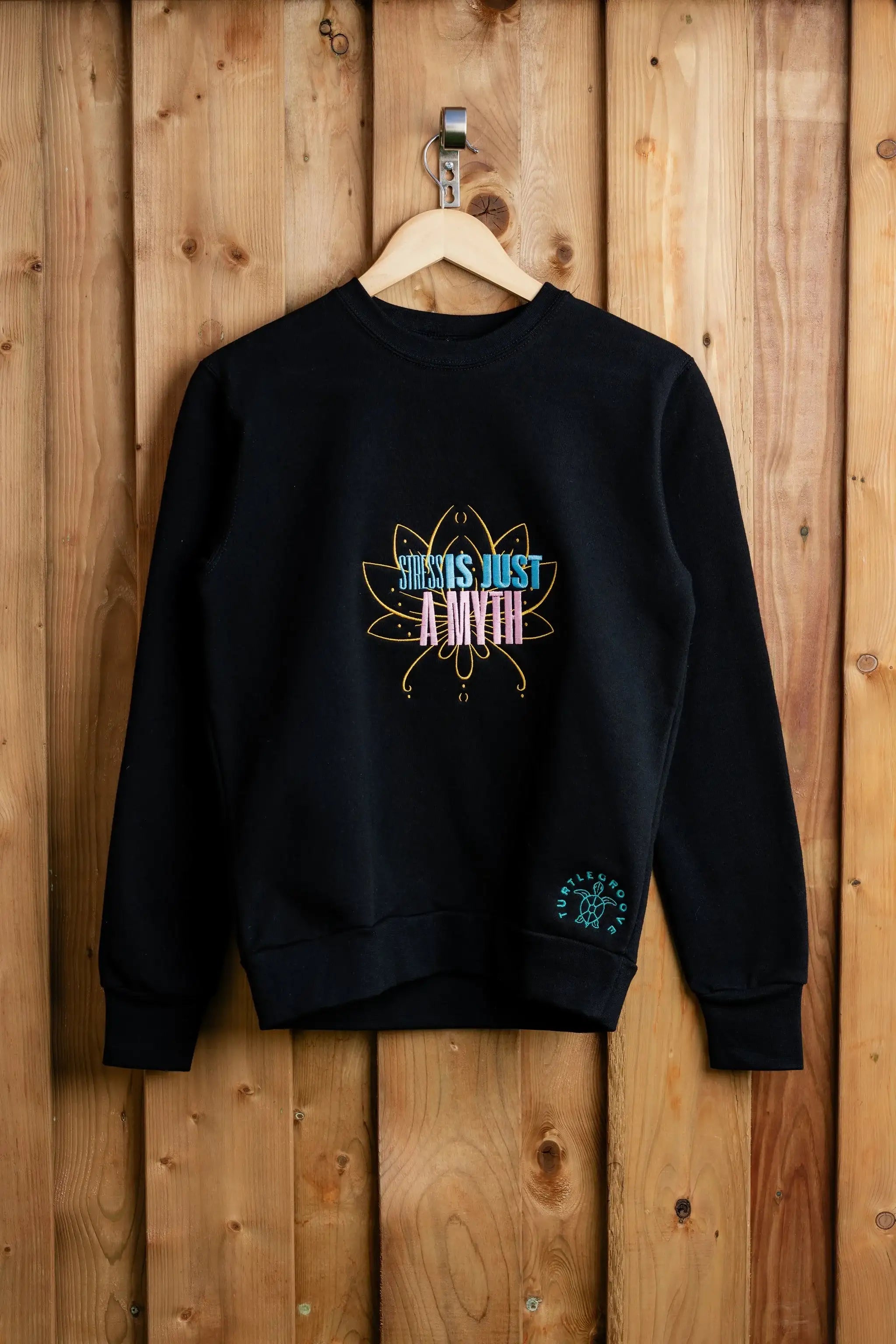 StressIsAMyth embroidered sweatshirt by TURTLEGROOVE – front view, black