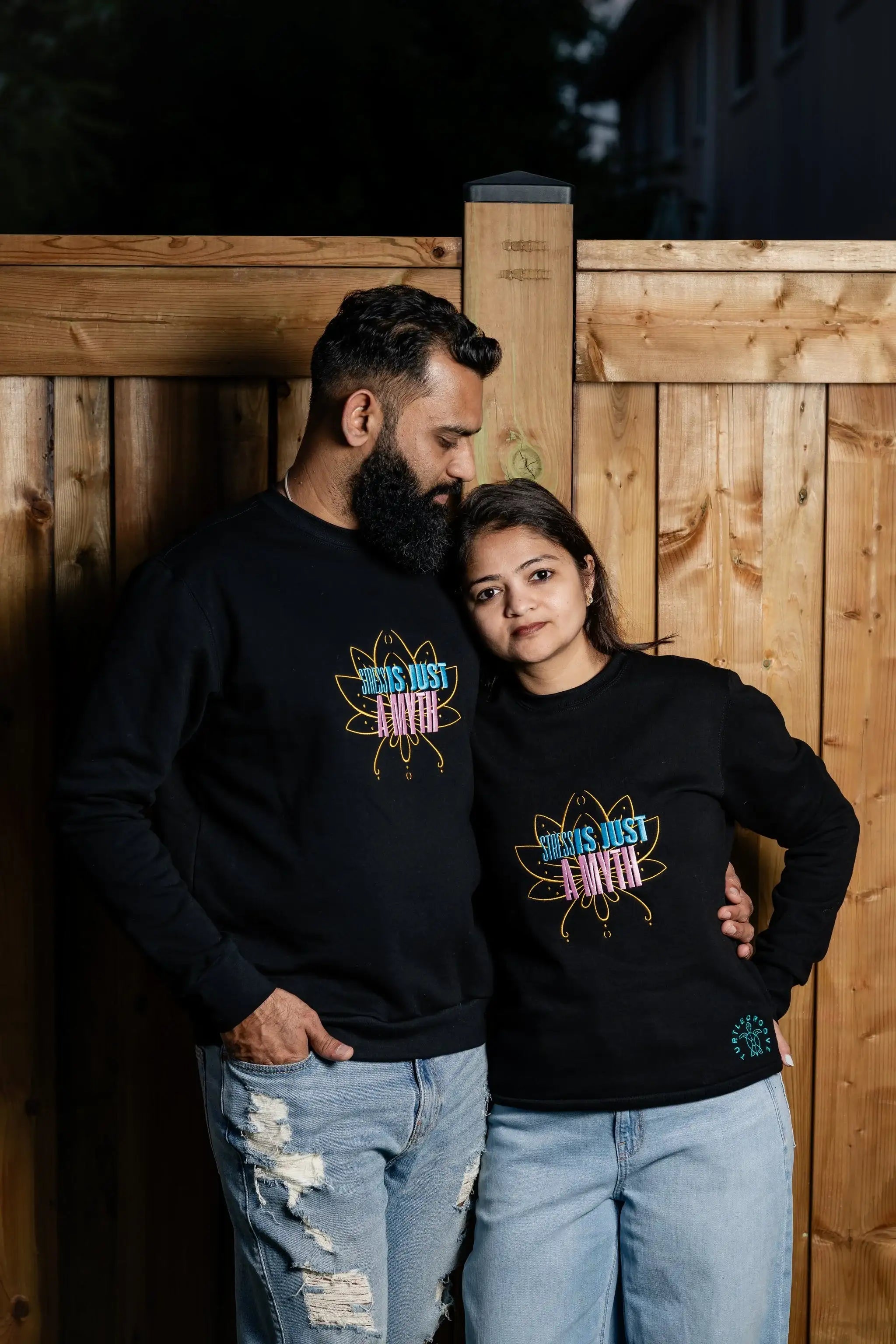 StressIsAMyth embroidered sweatshirt by TURTLEGROOVE – model wearing, black