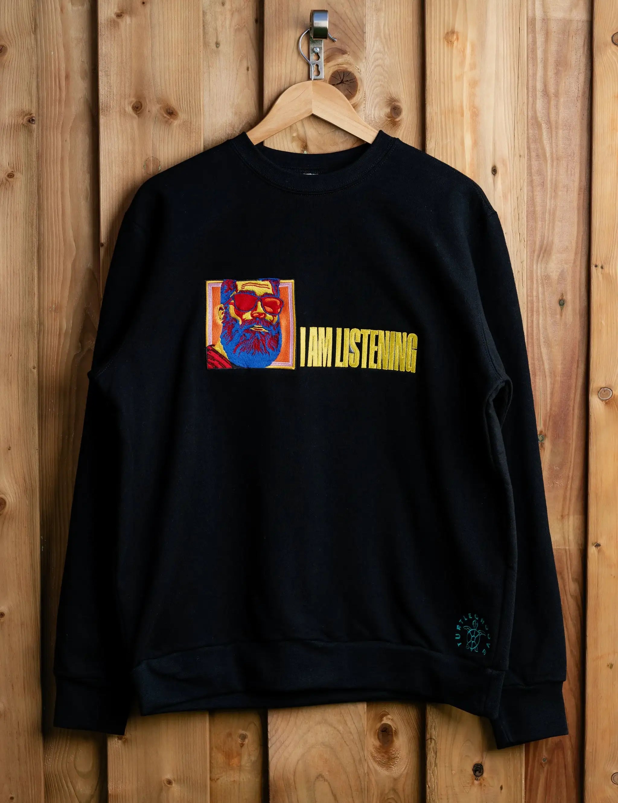 IAmListening embroidered sweatshirt by TURTLEGROOVE – front view, black