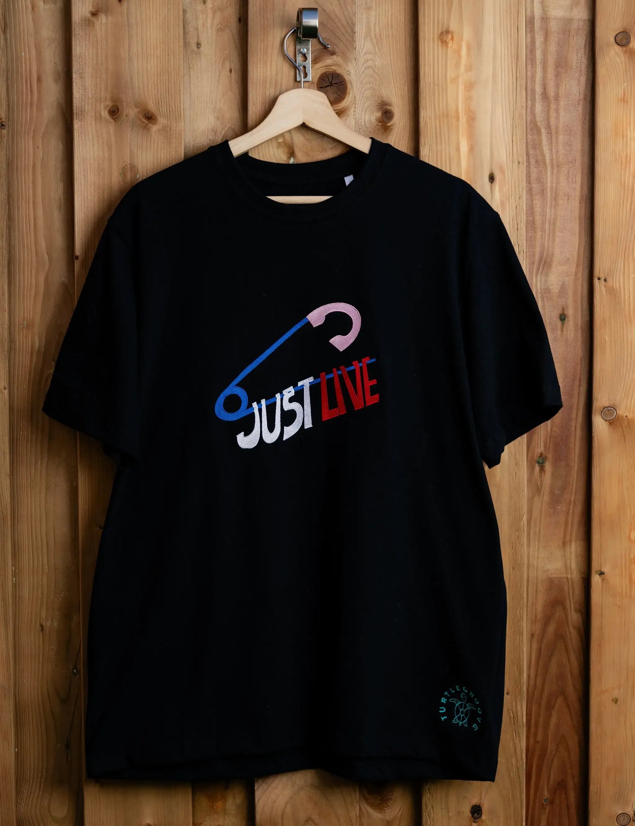 JustLive embroidered t-shirt by TURTLEGROOVE – front view, black
