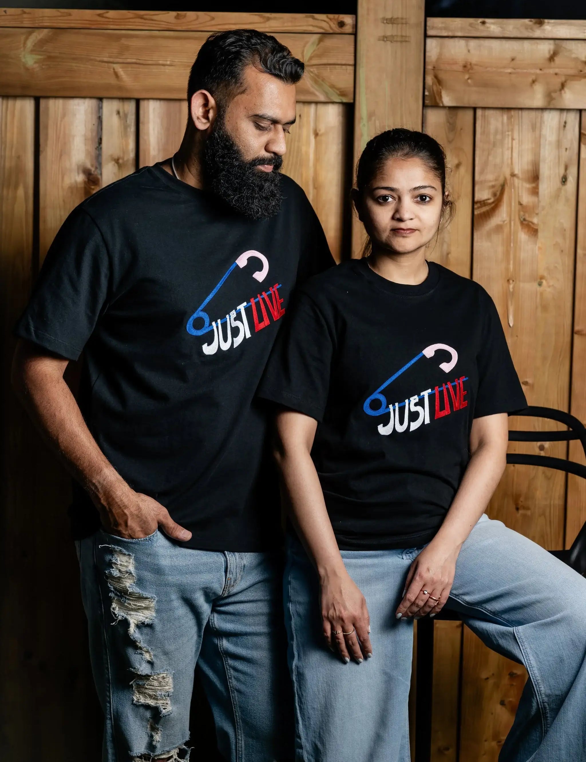 JustLive embroidered t-shirt by TURTLEGROOVE – model wearing, black