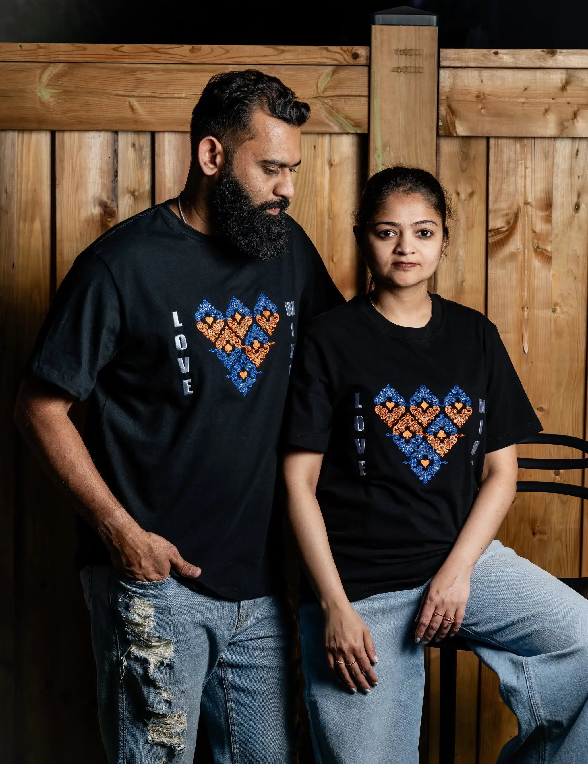 LoveWins embroidered t-shirt by TURTLEGROOVE – model wearing, black