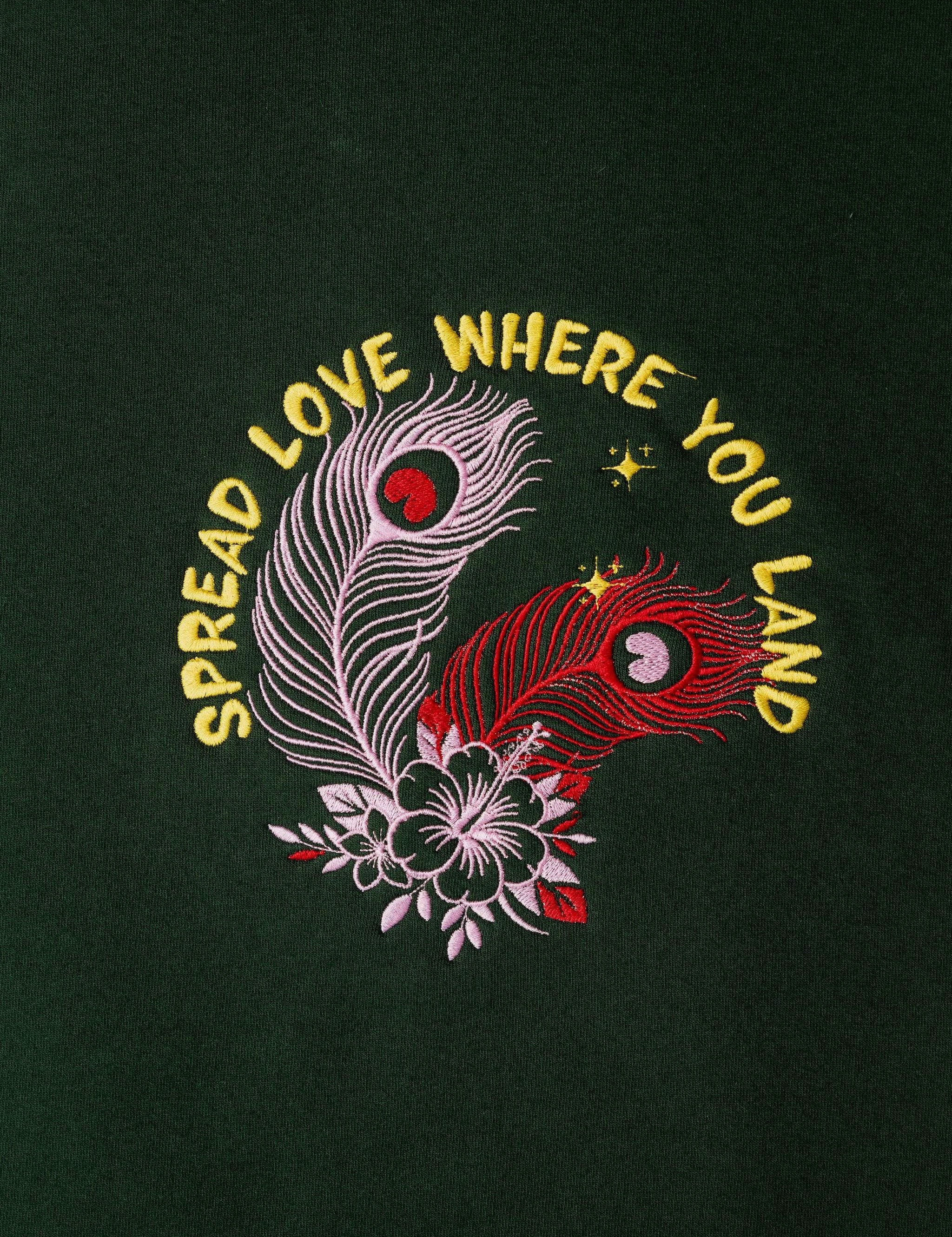 SpreadLove embroidered sweatshirt by TURTLEGROOVE – embroidery close-up detail, forest green