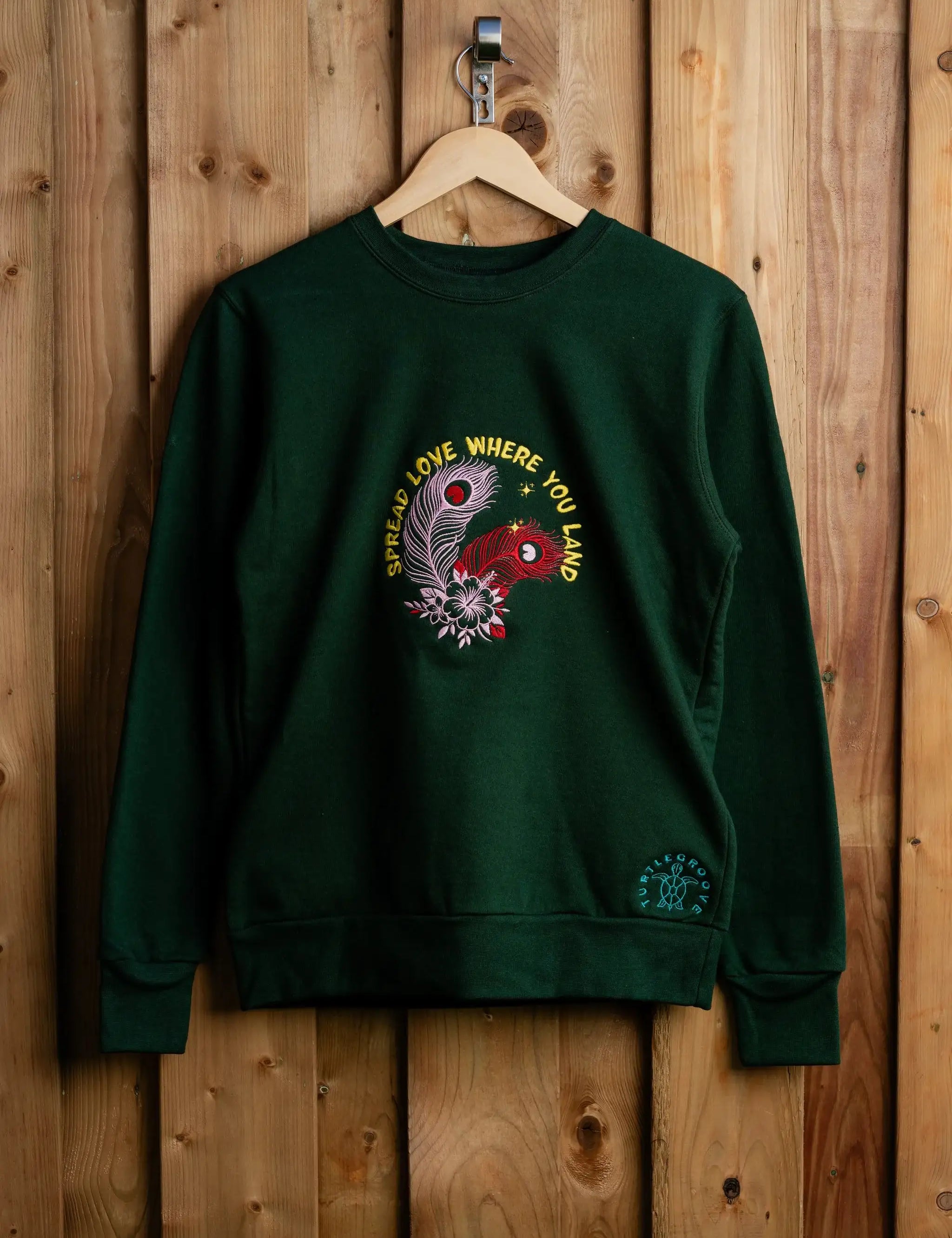 SpreadLove embroidered sweatshirt by TURTLEGROOVE – front view, forest green