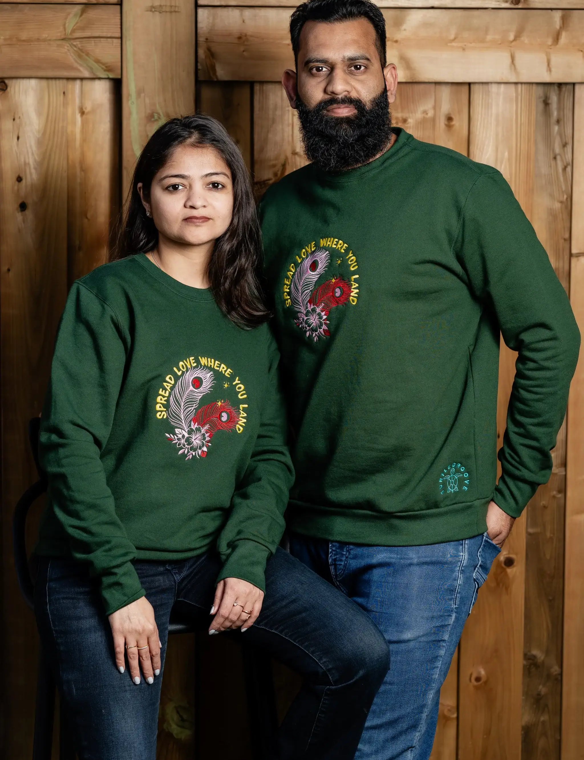 SpreadLove embroidered sweatshirt by TURTLEGROOVE – model wearing, forest green