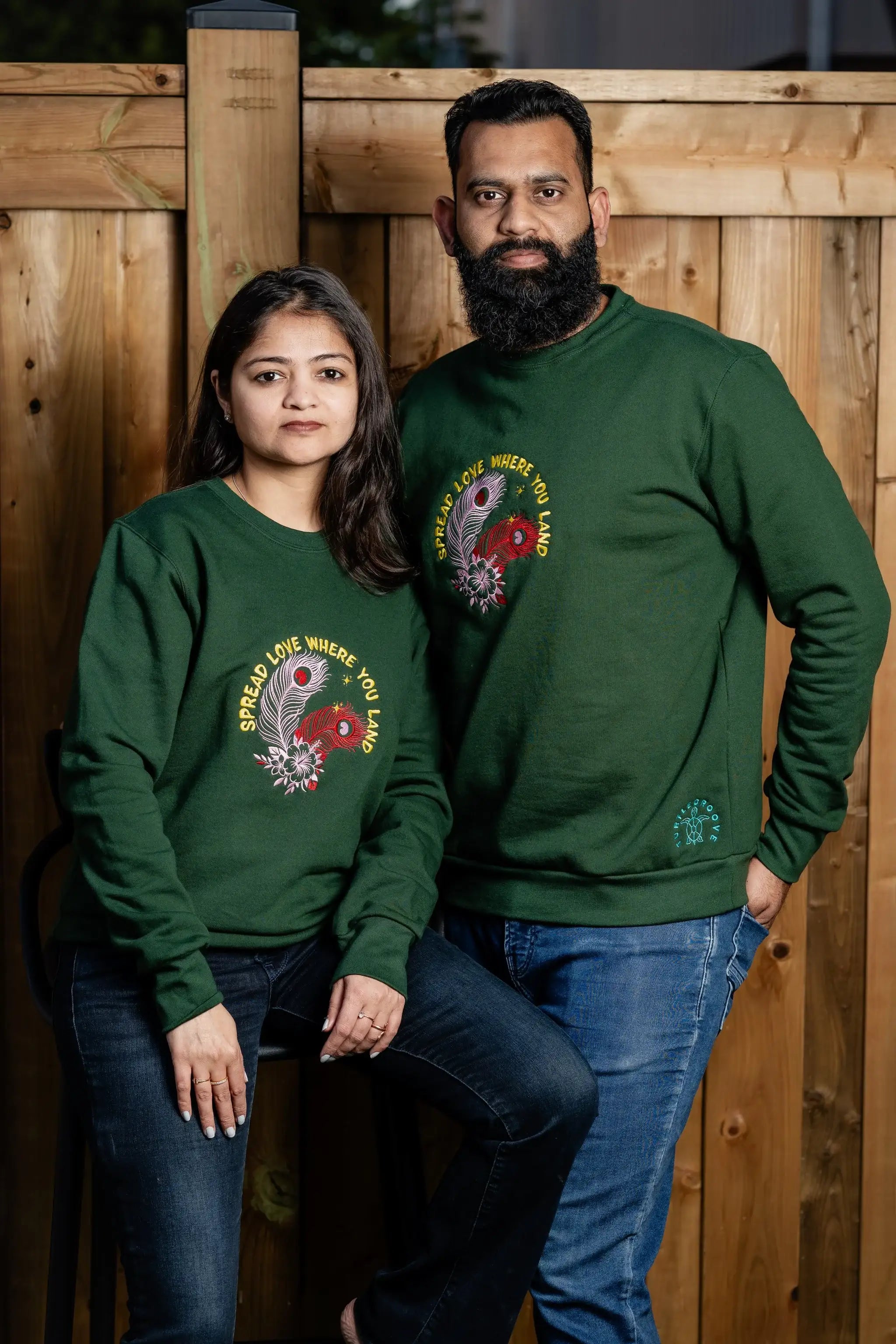 SpreadLove embroidered sweatshirt by TURTLEGROOVE – model wearing, forest green