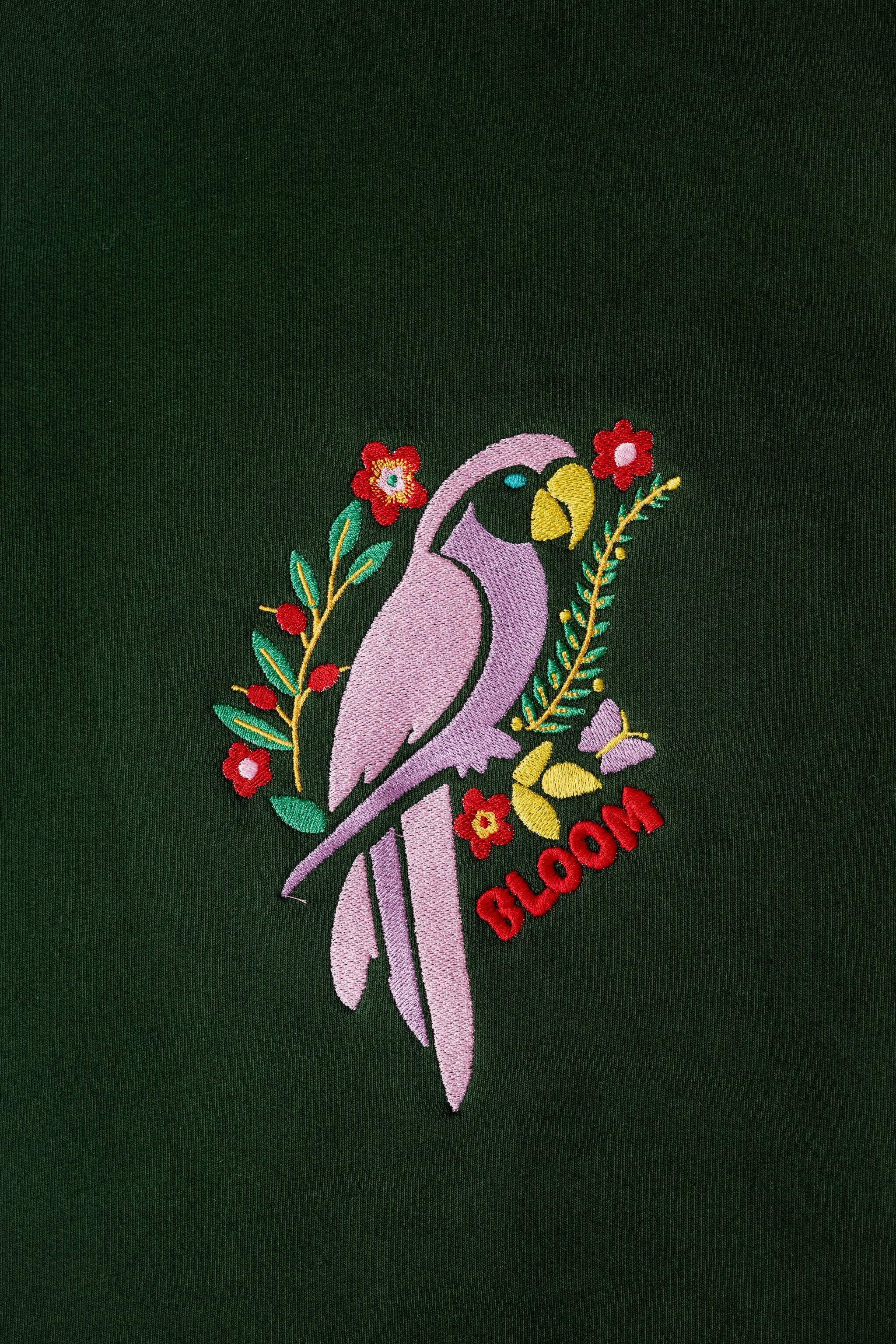 BloomParrot embroidered sweatshirt by TURTLEGROOVE – embroidery close-up detail, forest green