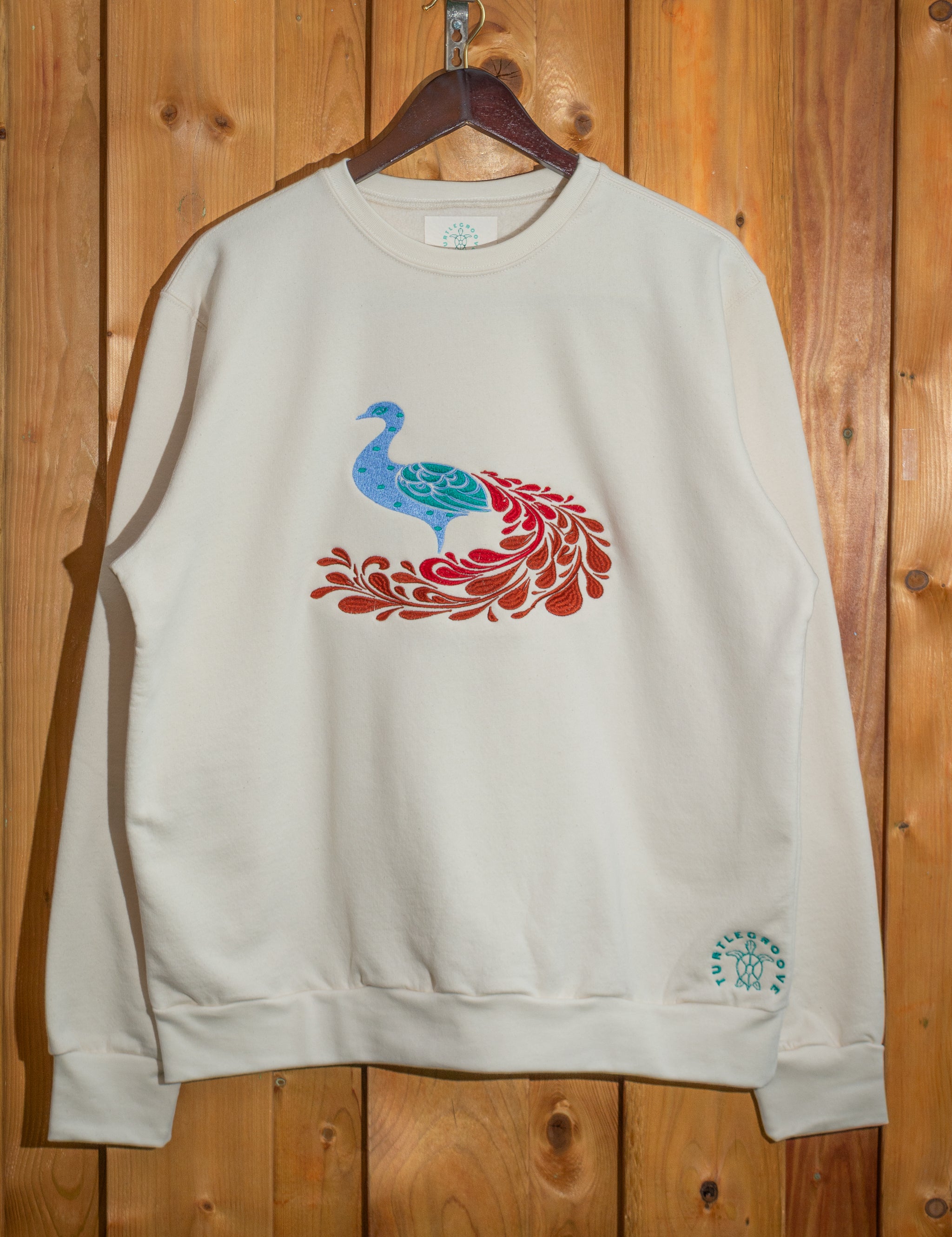 Peacock embroidered sweatshirt by TURTLEGROOVE – front view, Natural