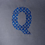 Q embroidered sweatshirt by TURTLEGROOVE – embroidery close-up detail, Oil Grey