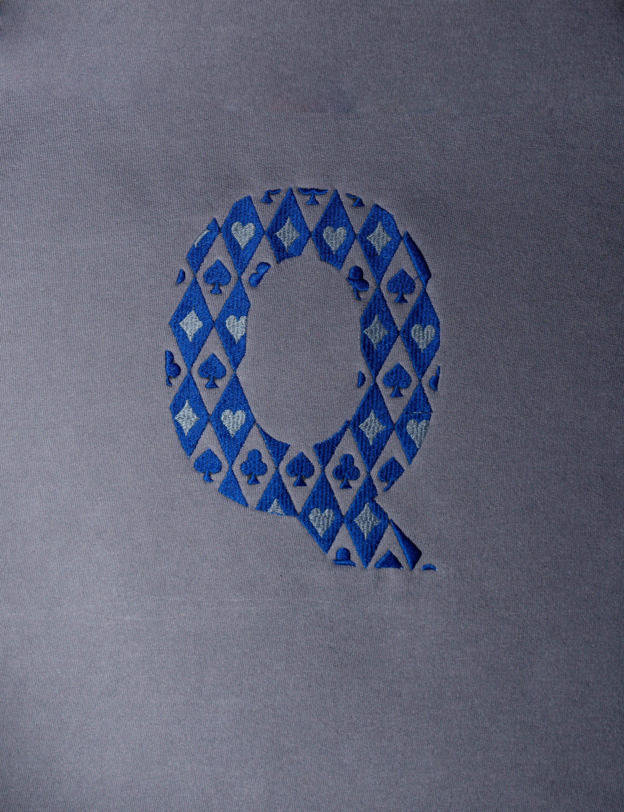 Q embroidered sweatshirt by TURTLEGROOVE – embroidery close-up detail, Oil Grey