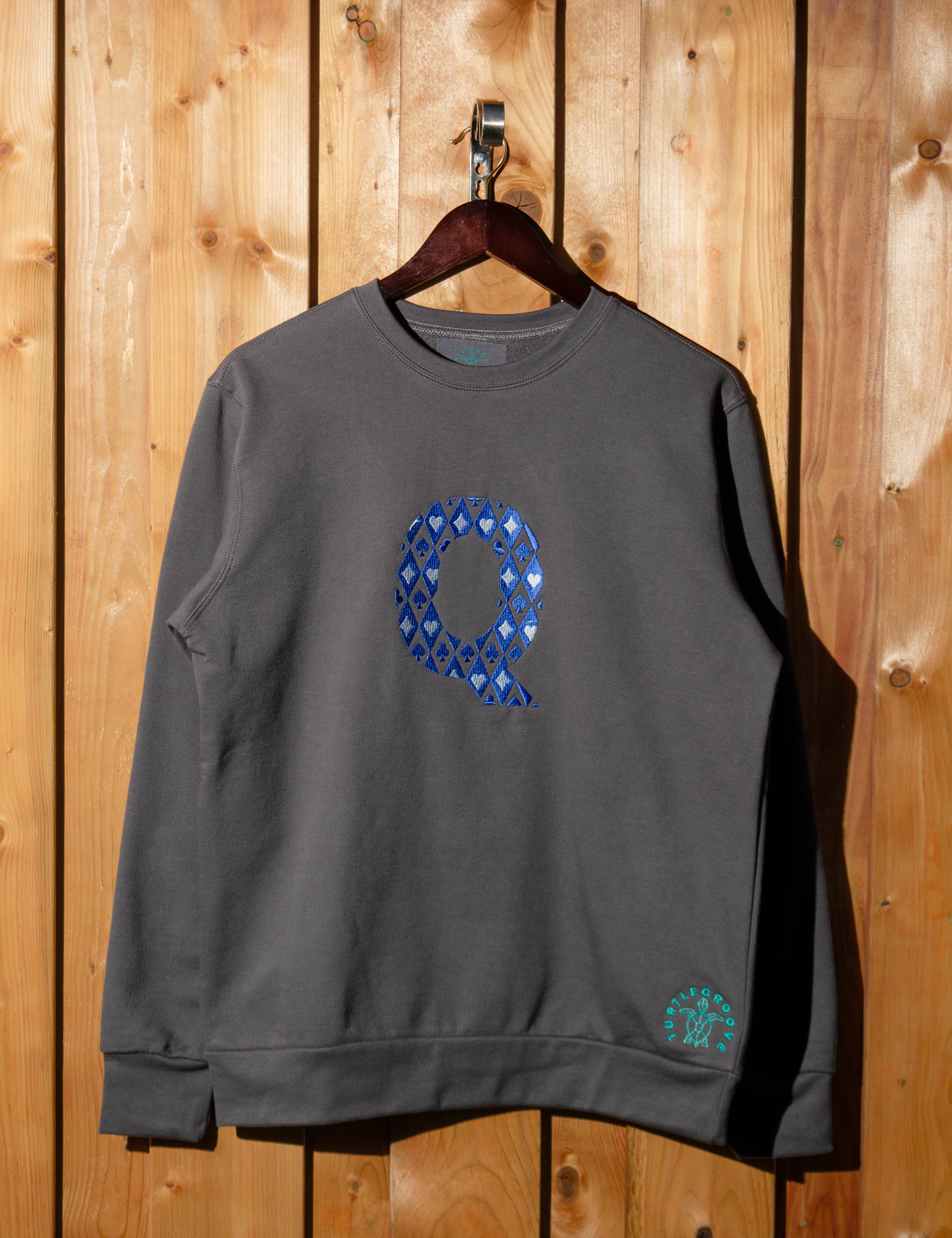 Q embroidered sweatshirt by TURTLEGROOVE – front view, Oil Grey