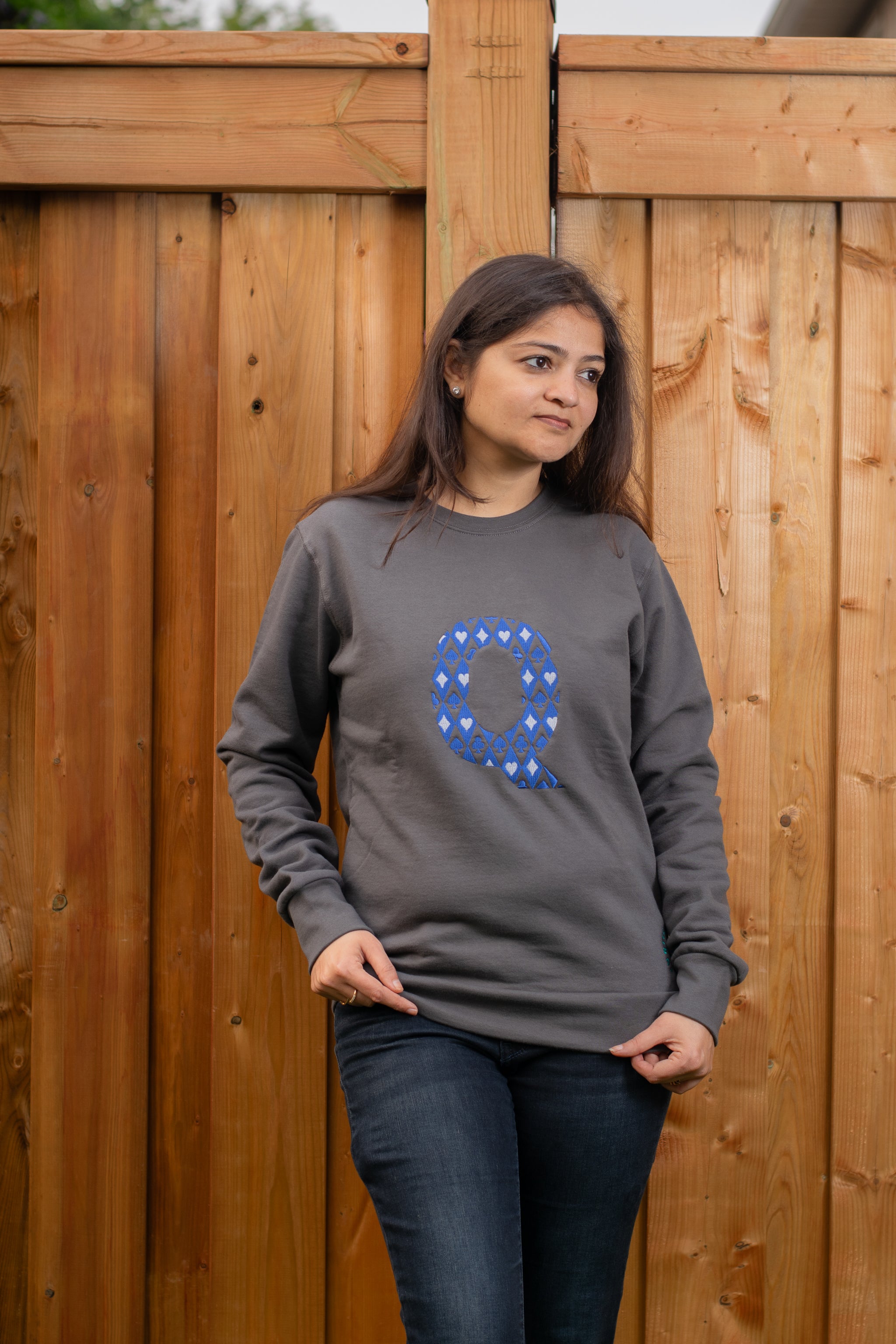 Q embroidered sweatshirt by TURTLEGROOVE – model wearing, Oil Grey