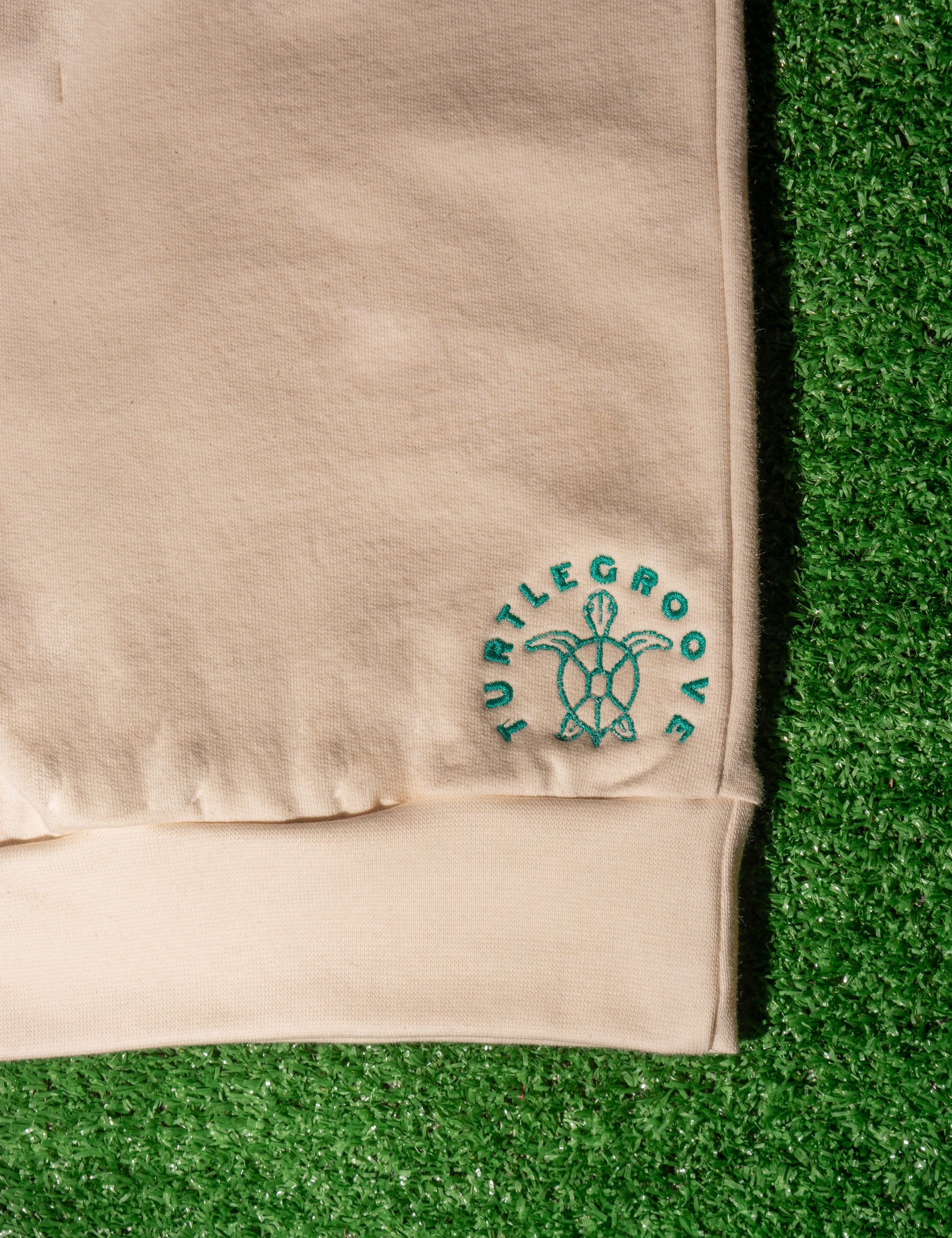 TURTLEGROOVE Made in Canada logo – natural embroidered sweatshirt