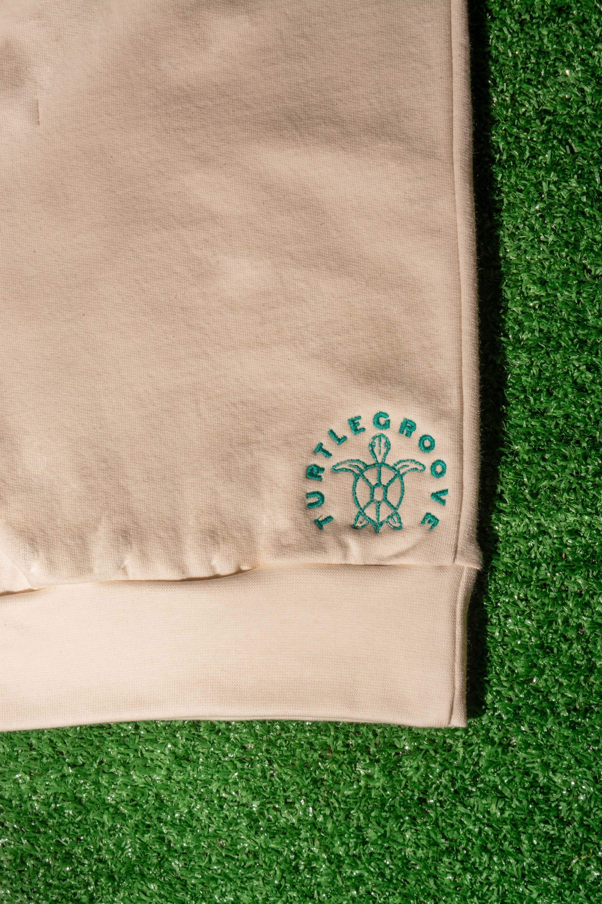TURTLEGROOVE Made in Canada logo – natural embroidered sweatshirt