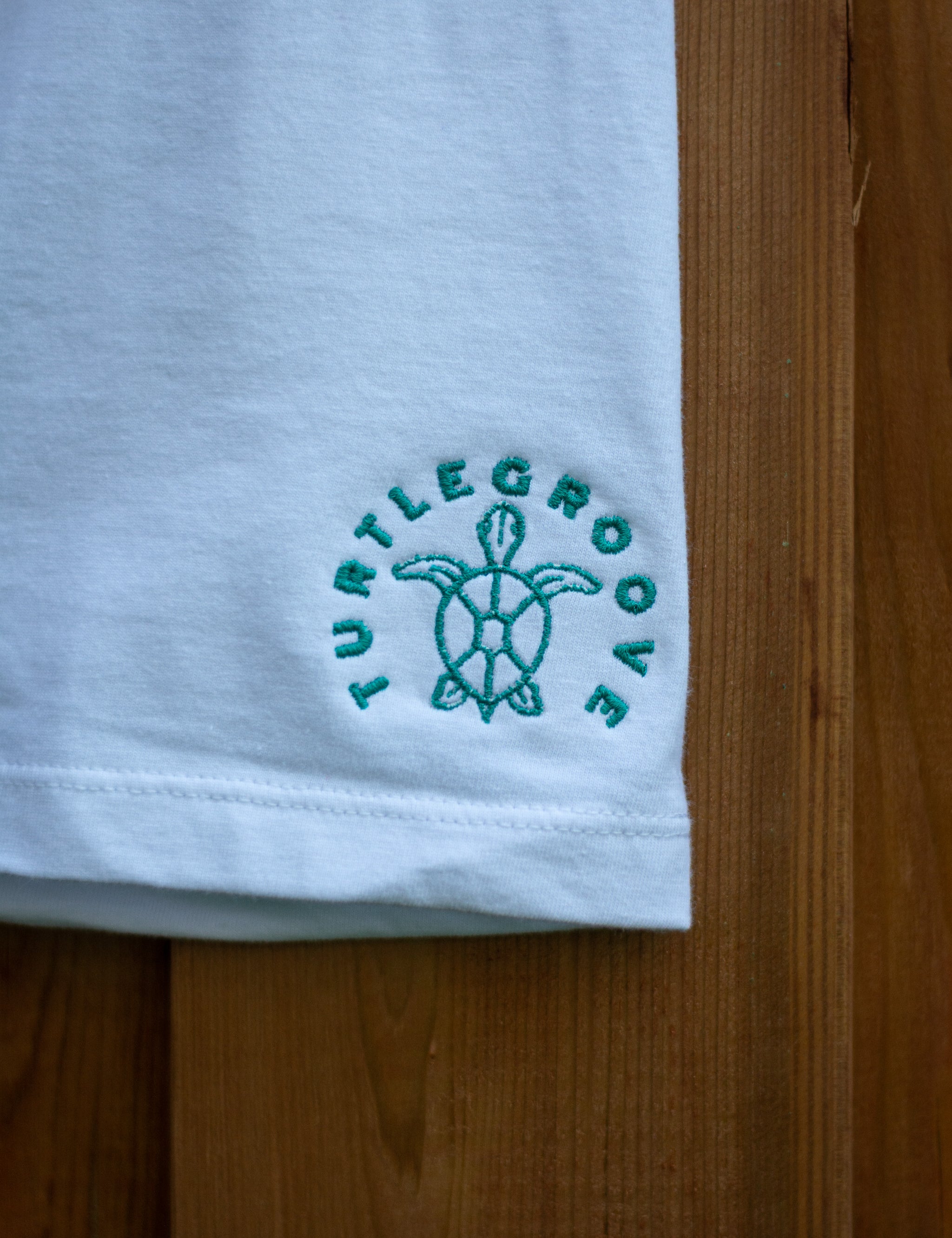 TURTLEGROOVE Made in Canada logo – white embroidered t-shirt