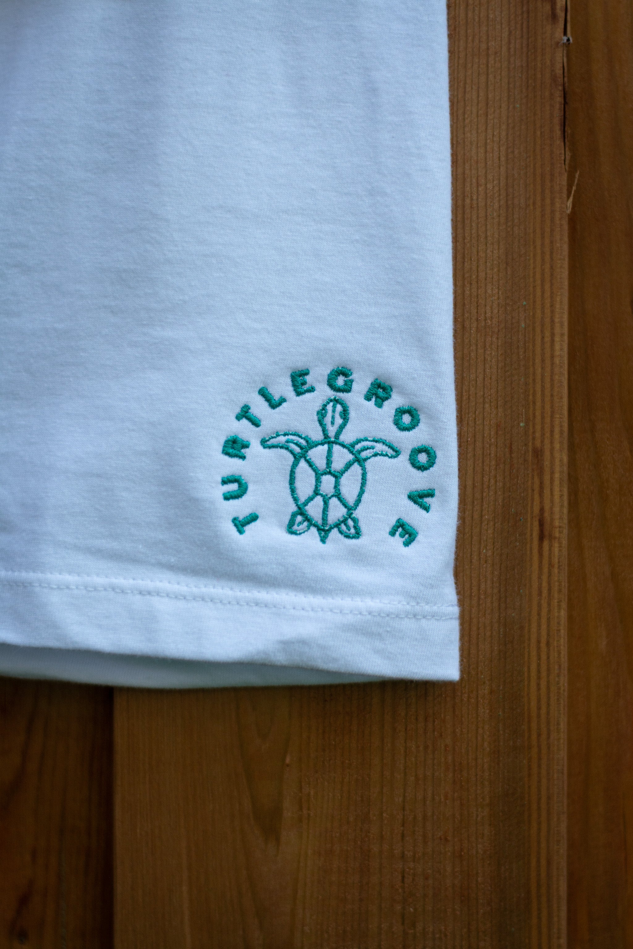 TURTLEGROOVE Made in Canada logo – white embroidered t-shirt