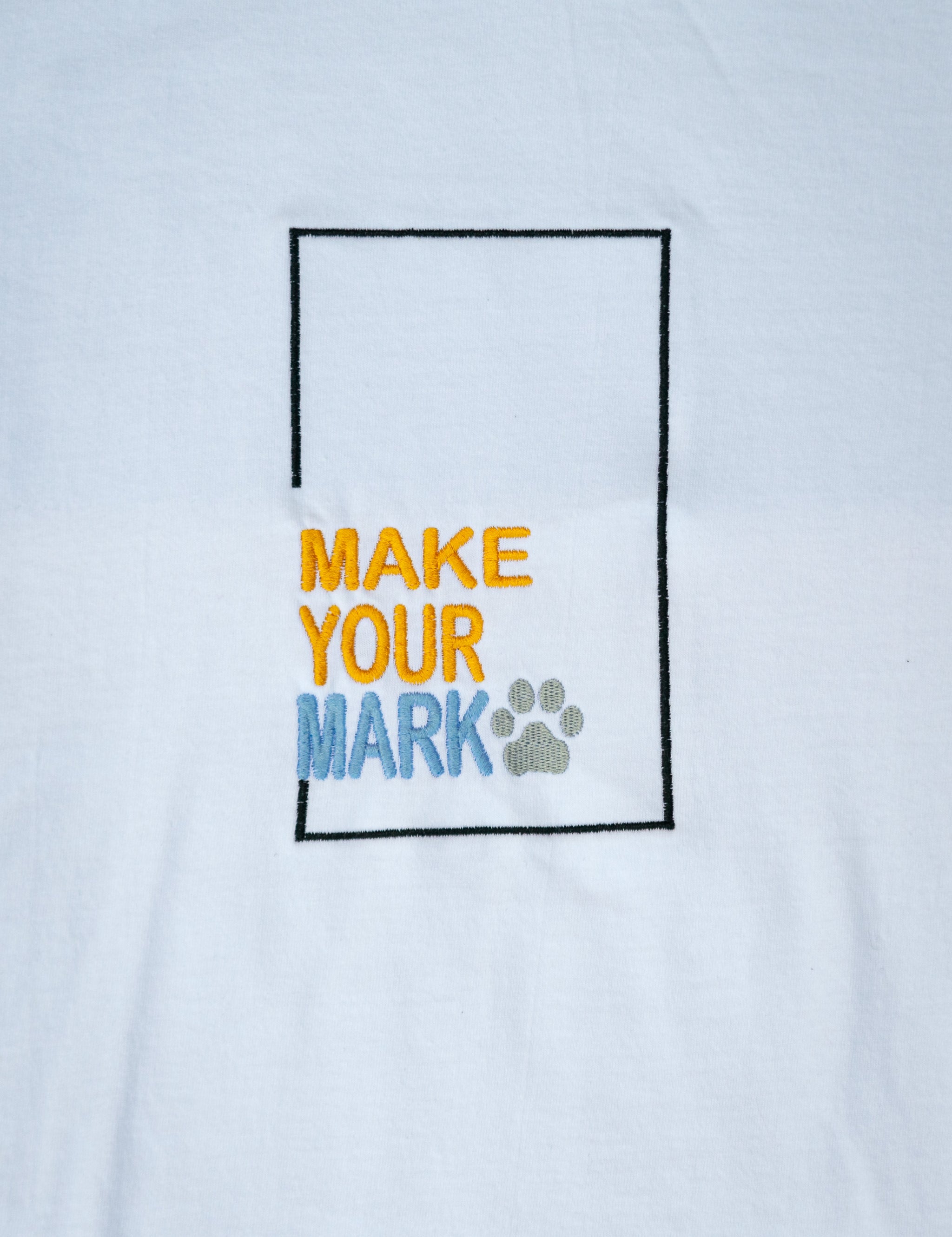 Make Your Mark embroidered t-shirt by TURTLEGROOVE – embroidery close-up detail, white