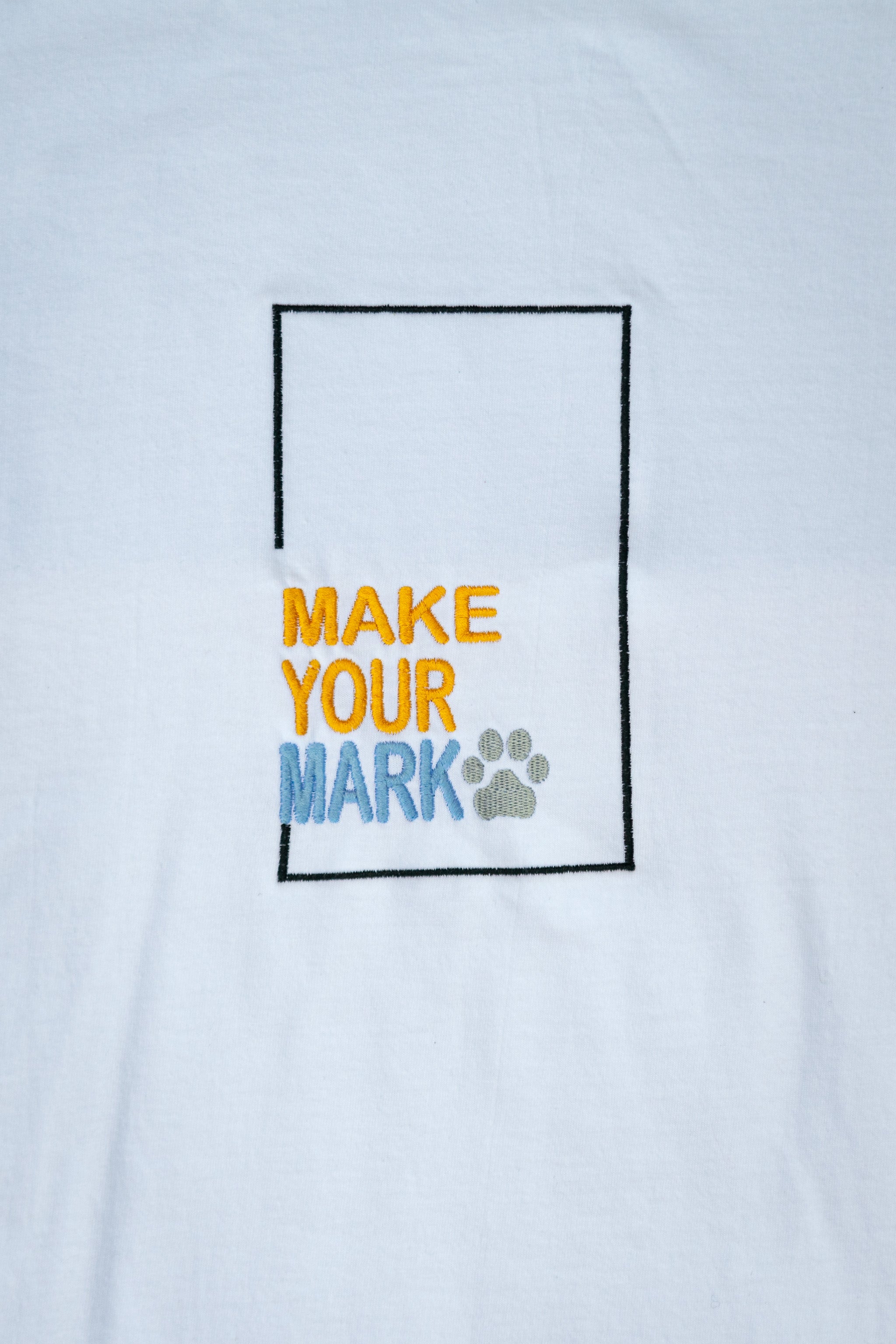 Make Your Mark embroidered t-shirt by TURTLEGROOVE – embroidery close-up detail, white