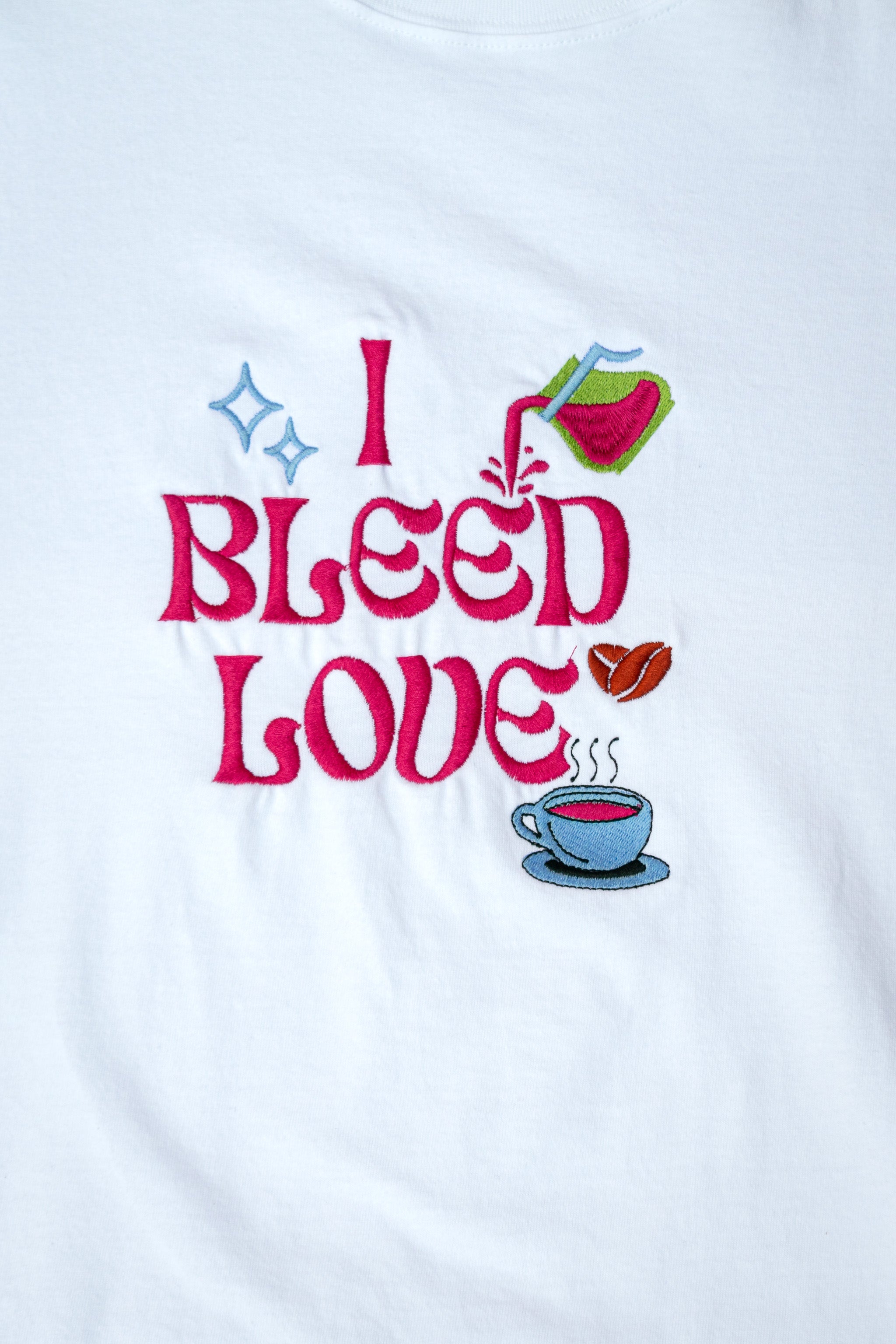 I Bleed Love embroidered t-shirt by TURTLEGROOVE – embroidery close-up, white
