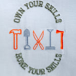 Own Your Skills embroidered t-shirt by TURTLEGROOVE – embroidery close-up detail, white