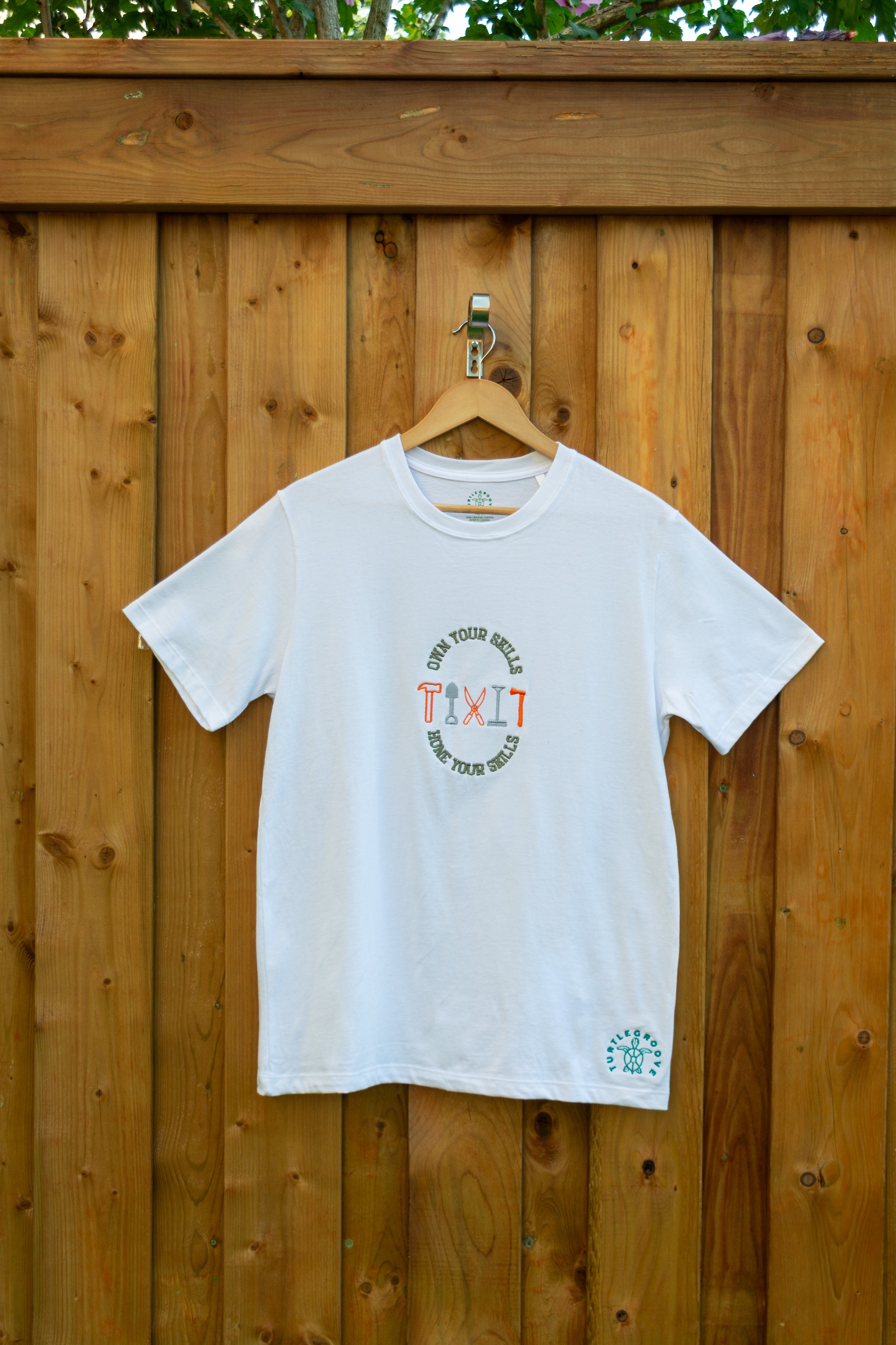 Own Your Skills embroidered t-shirt by TURTLEGROOVE – front view, white