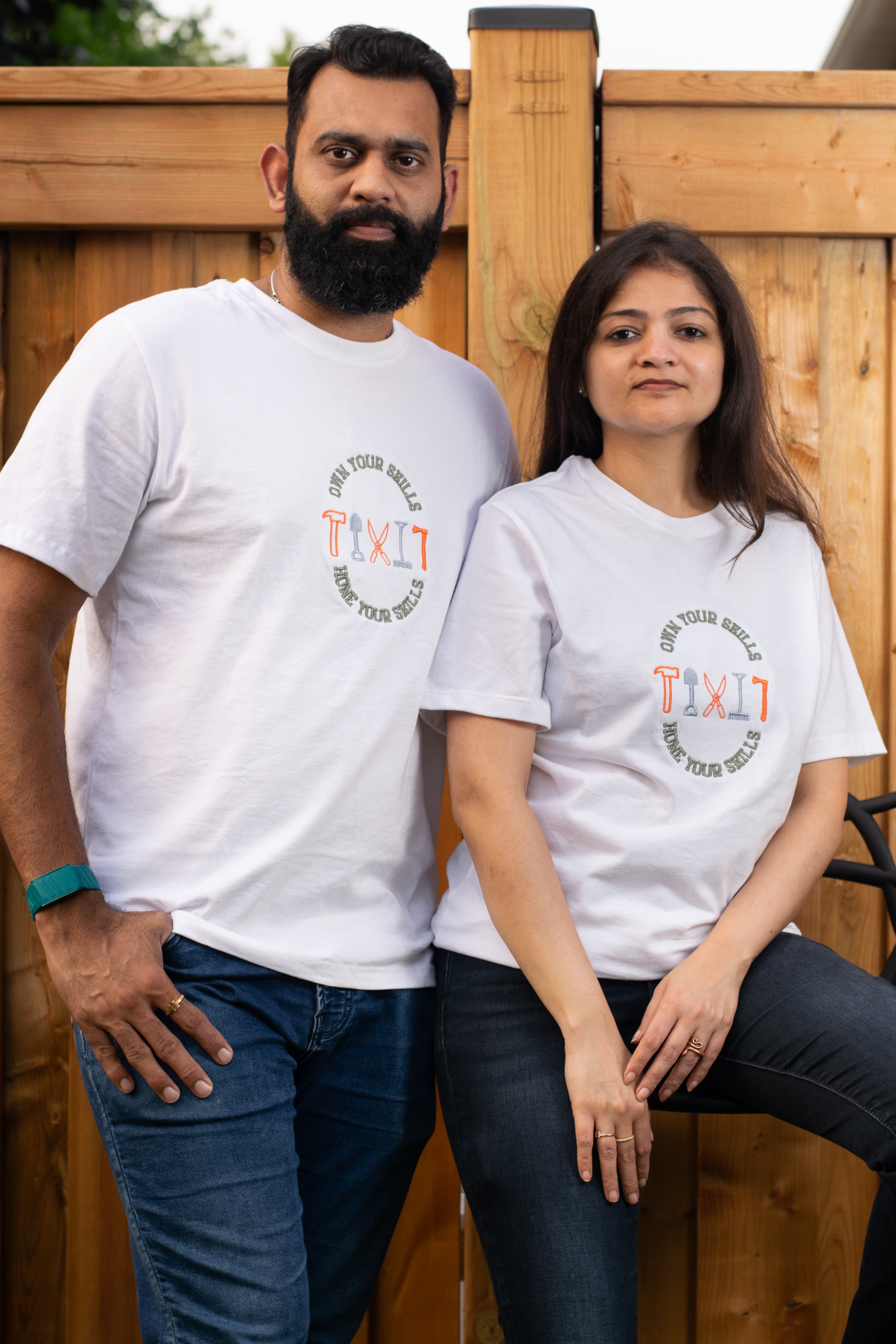 Own Your Skills embroidered t-shirt by TURTLEGROOVE – model wearing, white